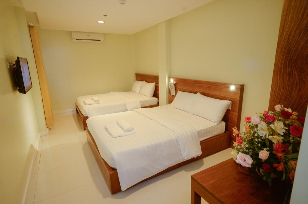 Marianne Hotel Puerto Princesa Habitación foto